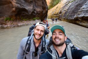 Selfie of Kent and Curt and the team following behind on the Virgin River. Zion National Park, Utah